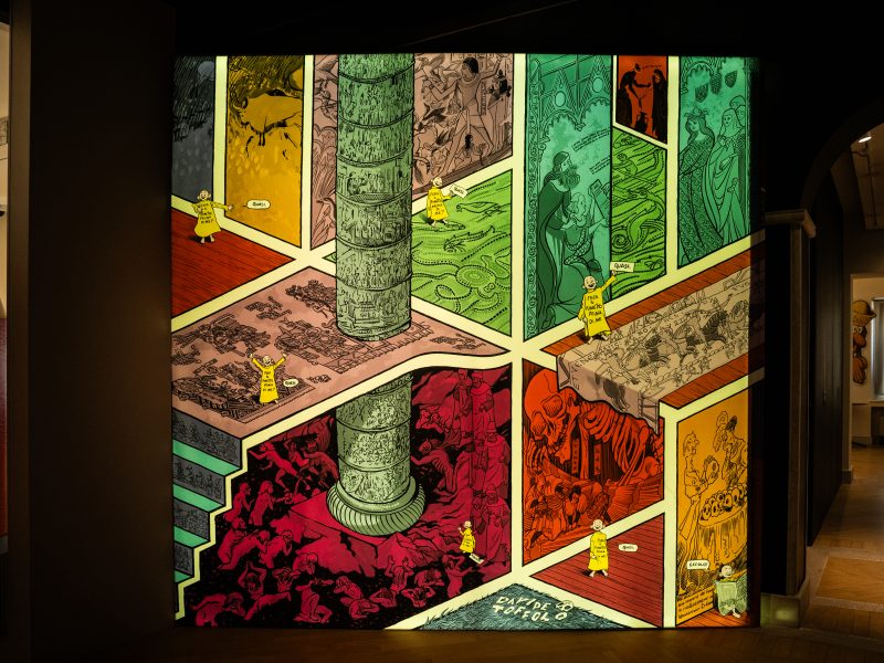 Nella grande tavola a fumetti (3x3 m) intitolata QUASI FUMETTO, pensata e disegnata da Davide Toffolo, Yellow Kid, il primo personaggio della storia dei fumetti, viaggia nel tempo e nello spazio, rappresentati come ideali sale di un museo, a verificare narrazioni per immagini in sequenza che diverse civiltà umane in varie epoche hanno realizzato.